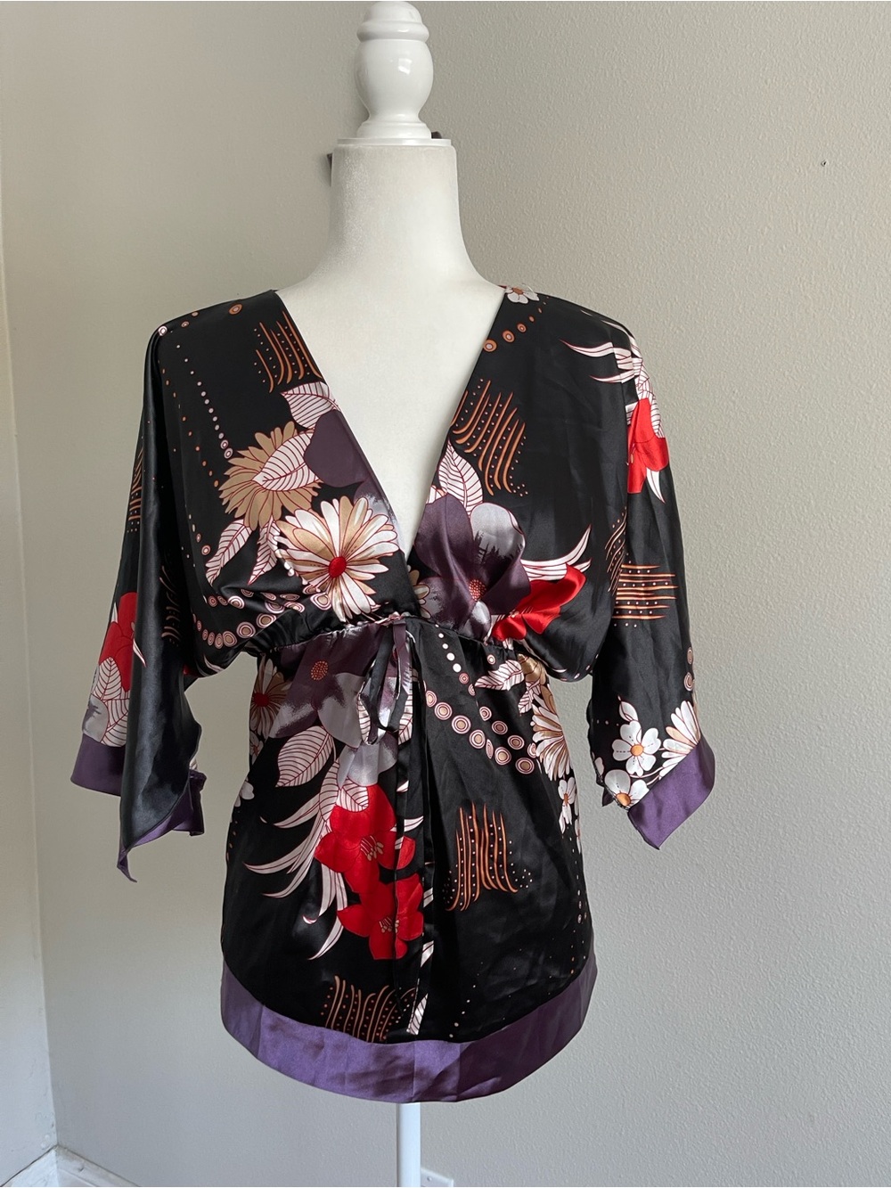 Vertigo Paris Black Satin Floral Wrap Top with Red & Purple Accents